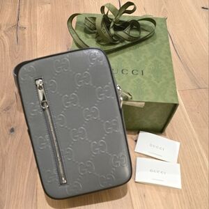 Authentic Mens Gucci Body Bag 700431 GG Embossed Leather Grey